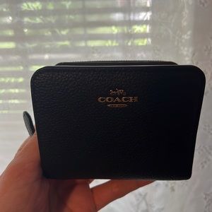 Small black Coach wallet